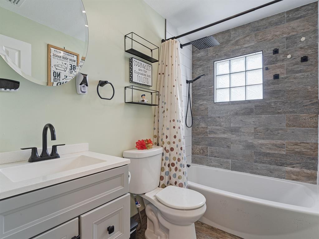 1360 Via Villanova Way Winter Springs, FL 32708 - Photo 23 of 32 a bathroom with a sink toilet and shower