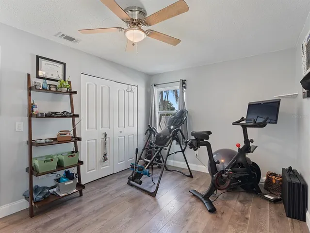 a view of a room with gym equipment