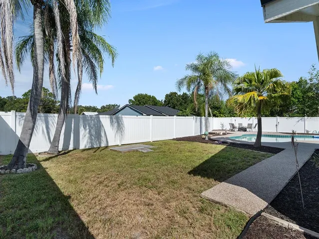 an outdoor space with swimming pool