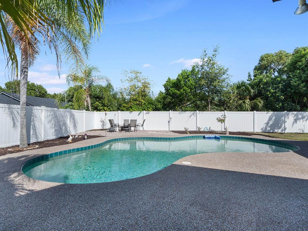 1360 Via Villanova Way Winter Springs, FL 32708 - Photo 29 of 32 a view of a swimming pool with a patio