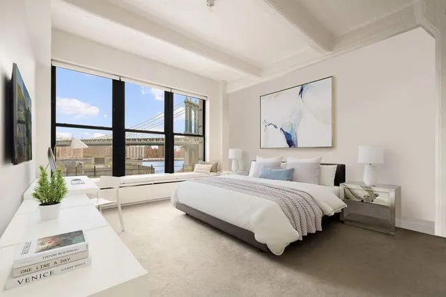 a kitchen with stainless steel appliances kitchen island granite countertop a cabinets and chair