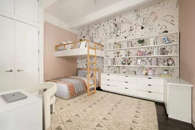 a bathroom with a tub shower and sink