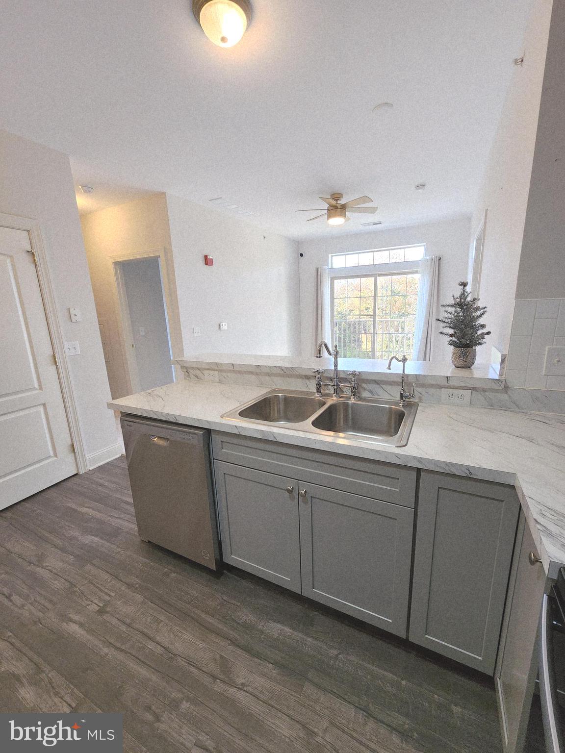 3000 Fountainview Circle, Unit 3411 Newark, DE 19713 - Photo 11 of 35 a kitchen with sink and window