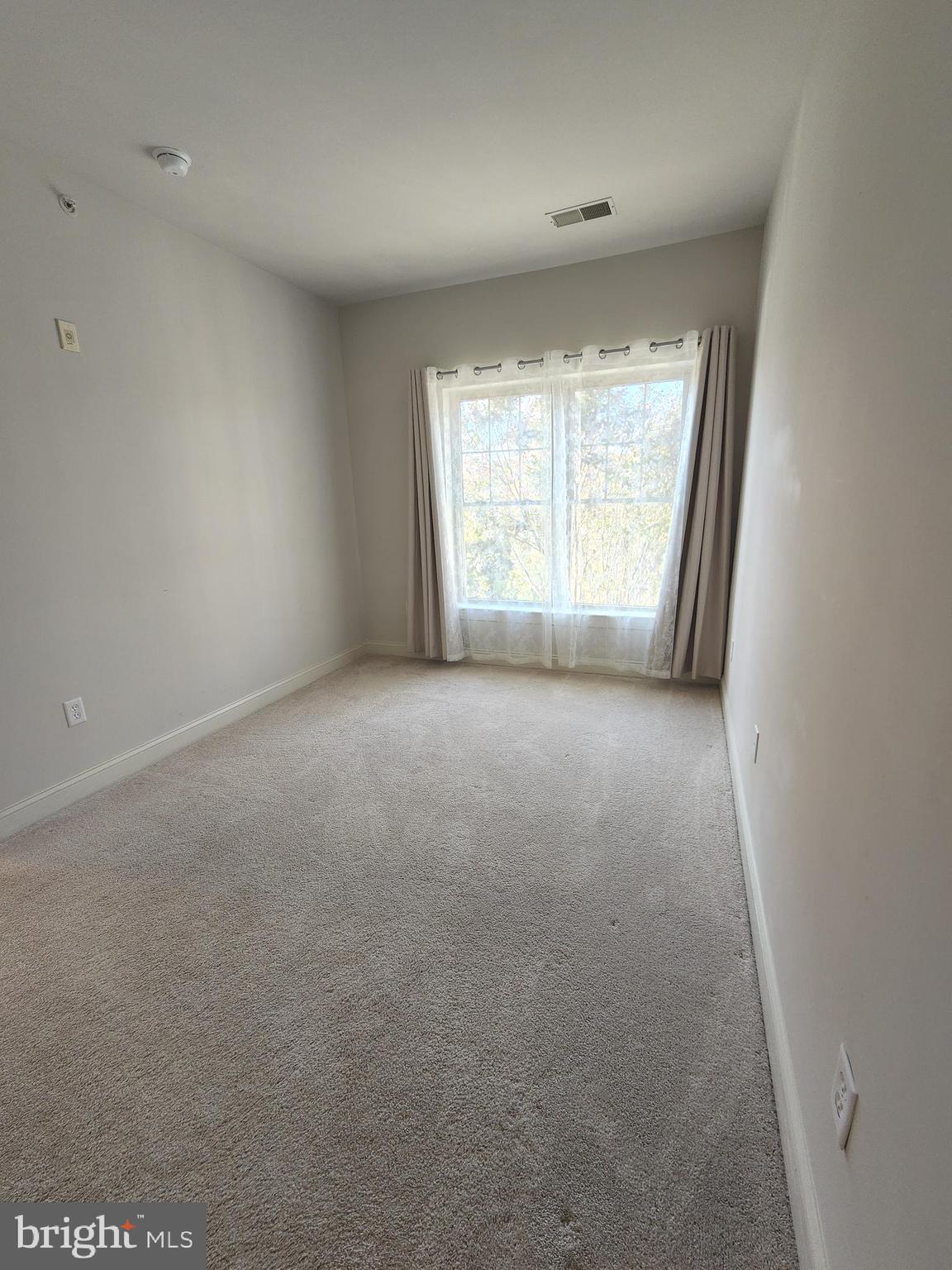 3000 Fountainview Circle, Unit 3411 Newark, DE 19713 - Photo 20 of 35 a view of an empty room with a window