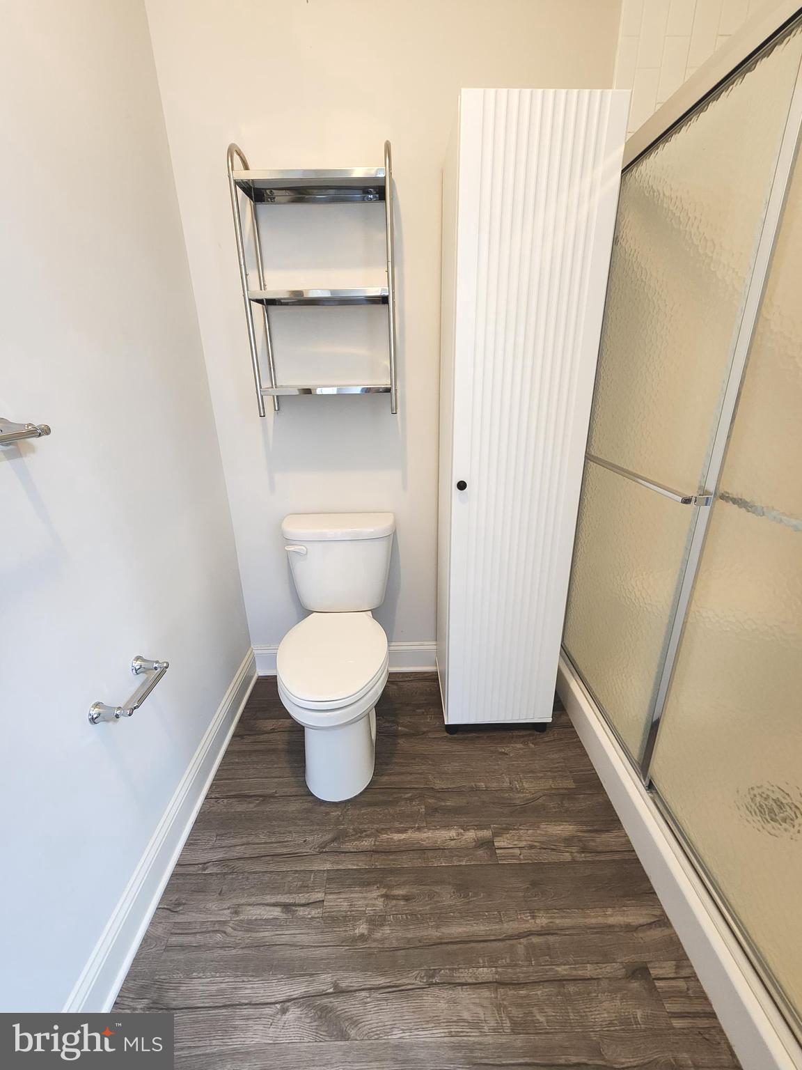 3000 Fountainview Circle, Unit 3411 Newark, DE 19713 - Photo 24 of 35 a bathroom with a toilet and a shower