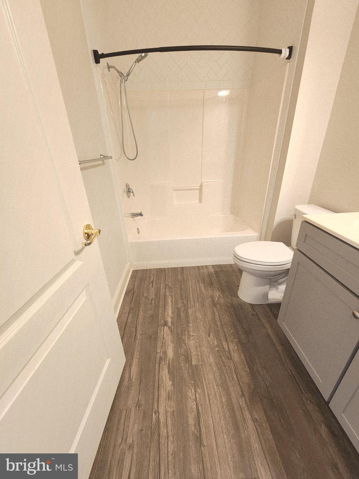 3000 Fountainview Circle, Unit 3411 Newark, DE 19713 - Photo 29 of 35 a bathroom with a toilet and a shower