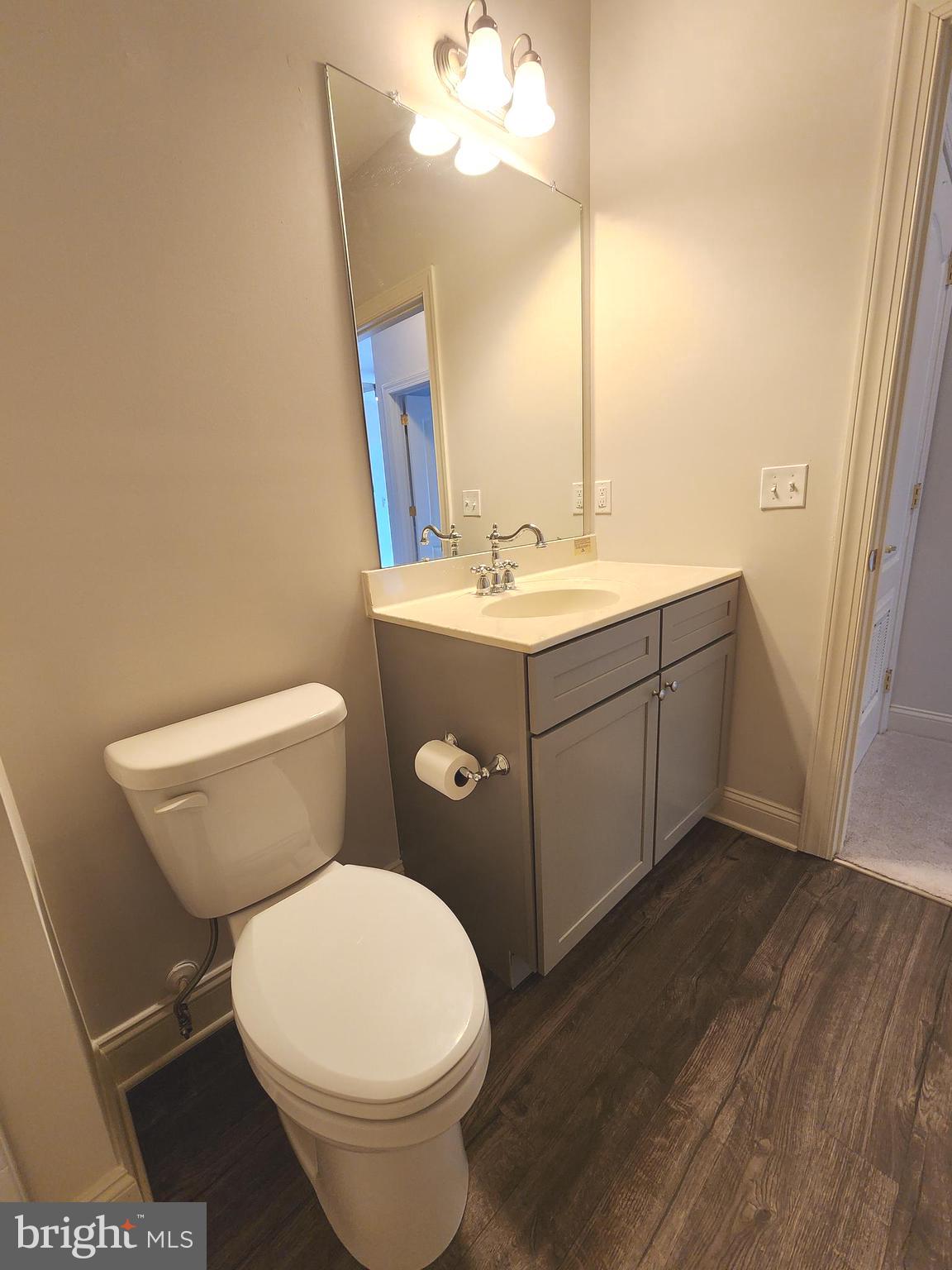 3000 Fountainview Circle, Unit 3411 Newark, DE 19713 - Photo 30 of 35 a bathroom with a sink and a toilet