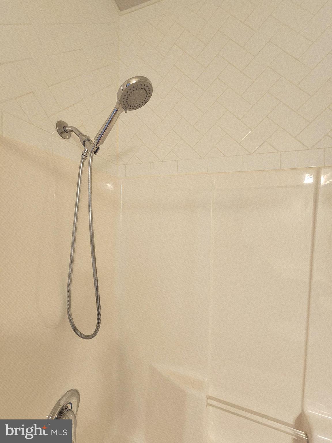 3000 Fountainview Circle, Unit 3411 Newark, DE 19713 - Photo 32 of 35 a bathroom with a shower