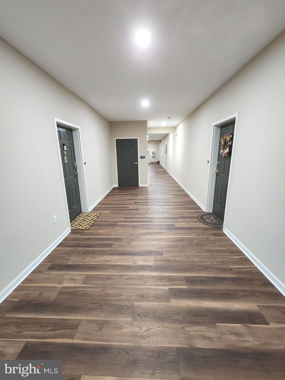 3000 Fountainview Circle, Unit 3411 Newark, DE 19713 - Photo 5 of 35 a view of empty room with wooden floor