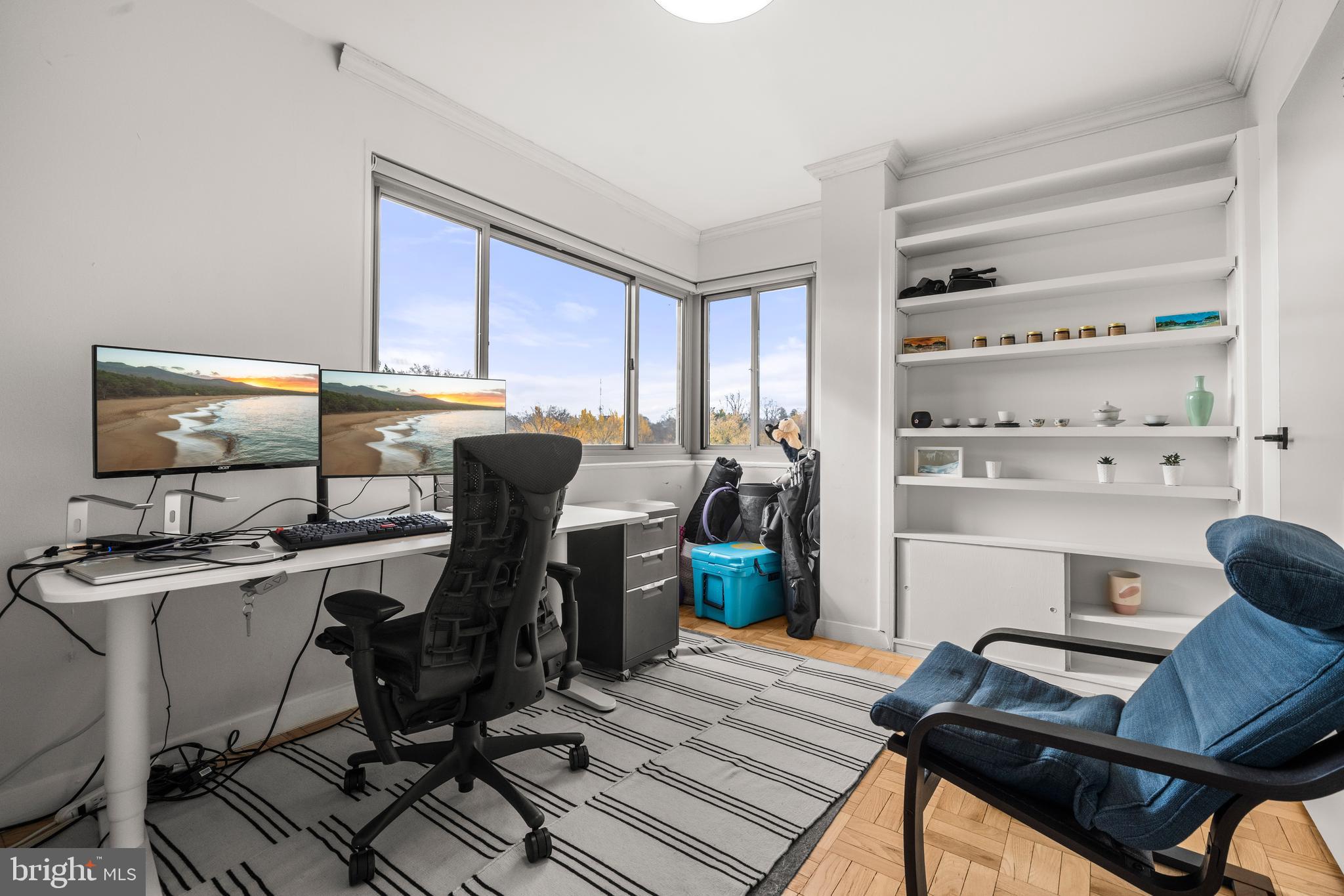 4600 Connecticut Avenue Northwest, Unit 810 Washington, DC 20008 - Photo 20 of 32 a view of a workspace with furniture and a window