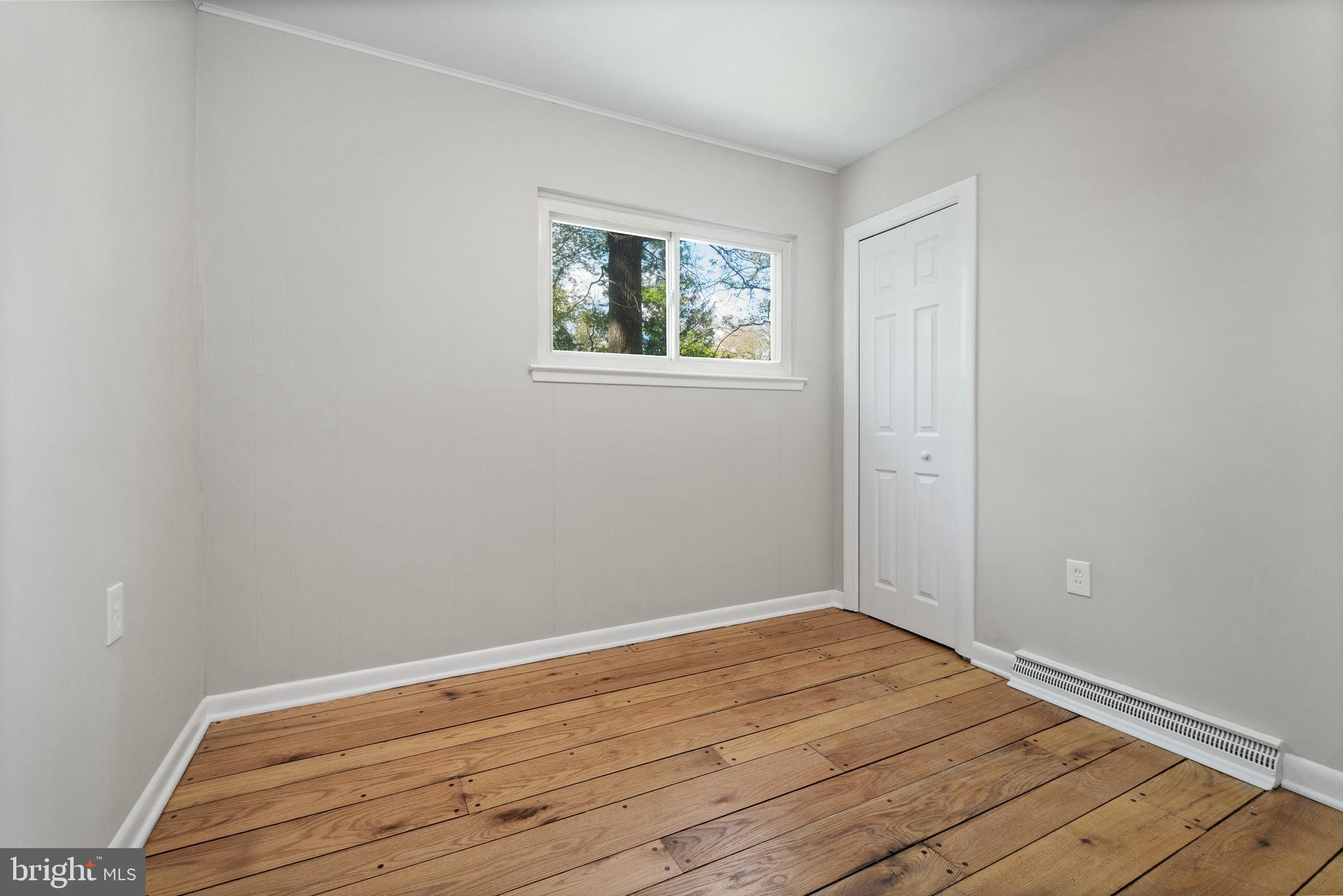 98 Wanner Road Reading, PA 19606 - Photo 22 of 30 a view of empty room with wooden floor