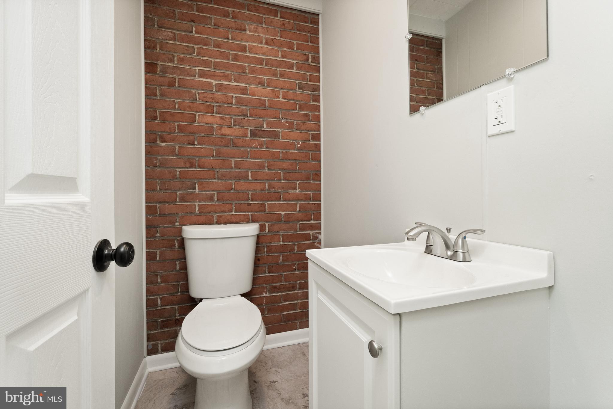 98 Wanner Road Reading, PA 19606 - Photo 10 of 30 a bathroom with a toilet sink and mirror