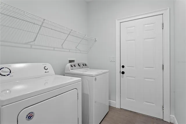 a utility room with dryer and washer