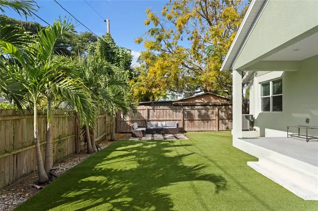 a view of a backyard with a garden