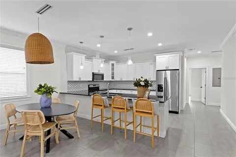 a view of a dining room with furniture