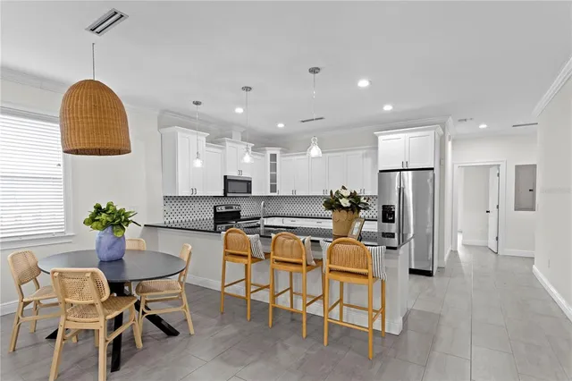 a view of a dining room with furniture