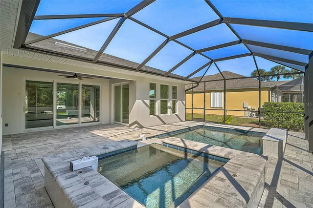 an aerial view of a house with a garden