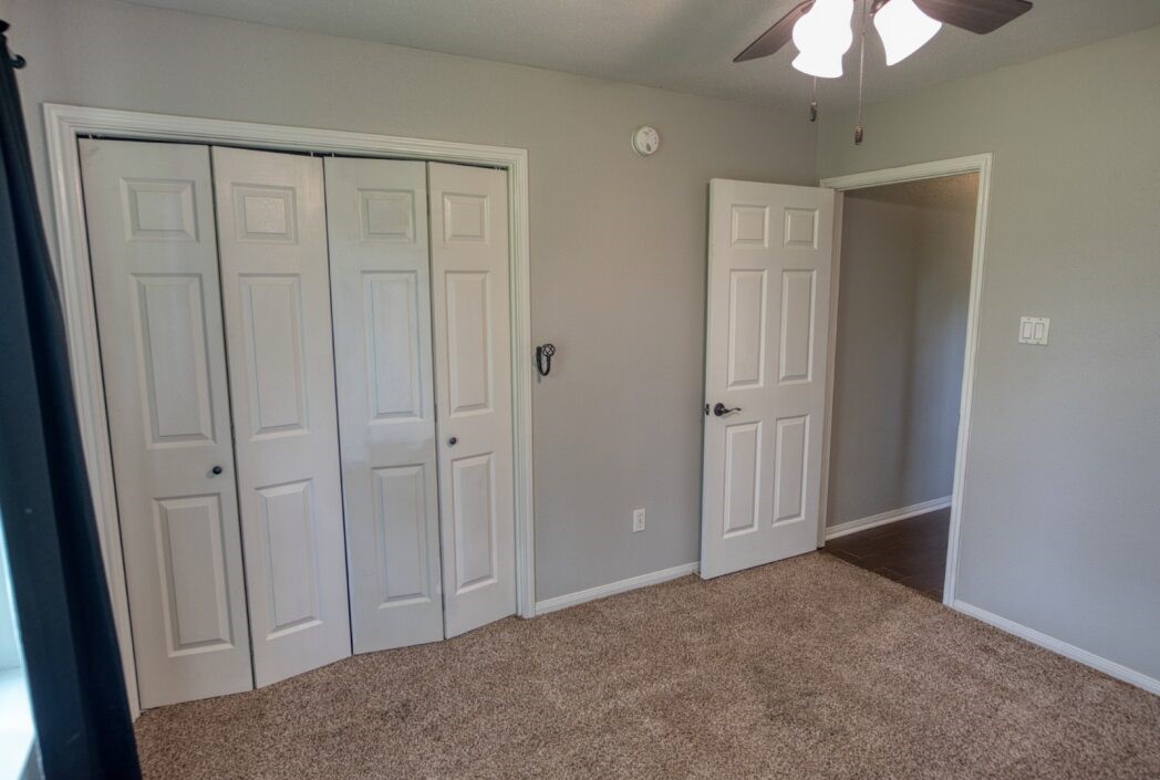 308 County Road 893B Angleton, TX 77515 - Photo 23 of 41 a view of a livingroom with a chandelier fan