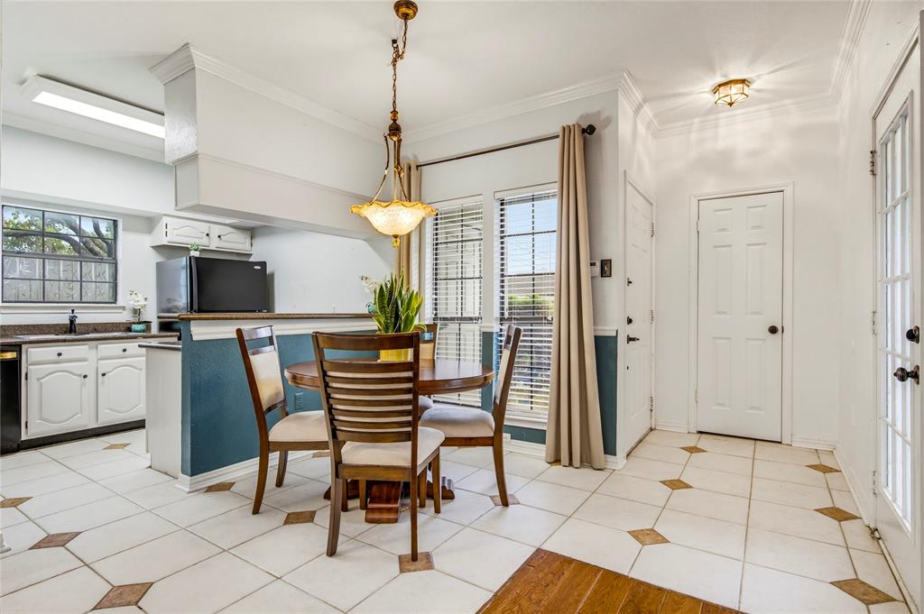 2835 Keller Springs Road, Unit 101 Carrollton, TX 75006 - Photo 2 of 22 Gorgeous tiled flooring from the entry with accent inserts, recessed lighting, cozy dining space and a kitchen featuring white cabinetry and granite countertops....