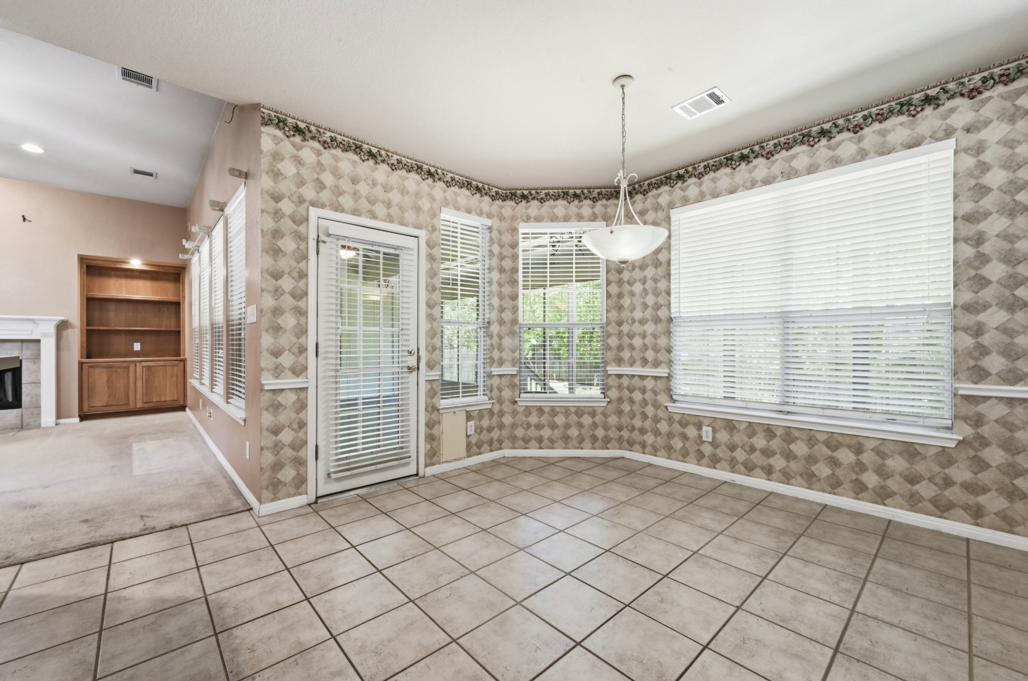11500 Arbor Downs Road Austin, TX 78748 - Photo 20 of 40 Breakfast Nook door opens to spacious Sunroom