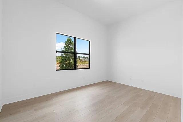 a view of cabinets with washer and dryer