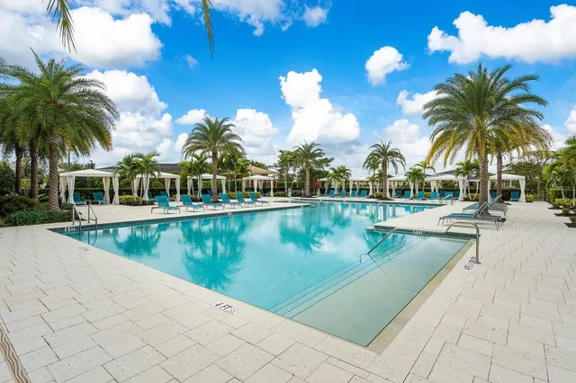 a view of a park with slide and a table