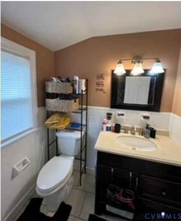 3732 Birdwood Road Richmond, VA 23234 - Photo 14 of 28 a bathroom with a sink toilet and mirror