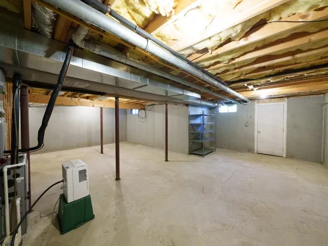 a bathroom with a shower and toilet