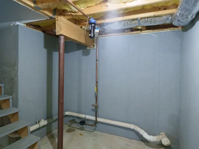 a view of a street with a building in the background