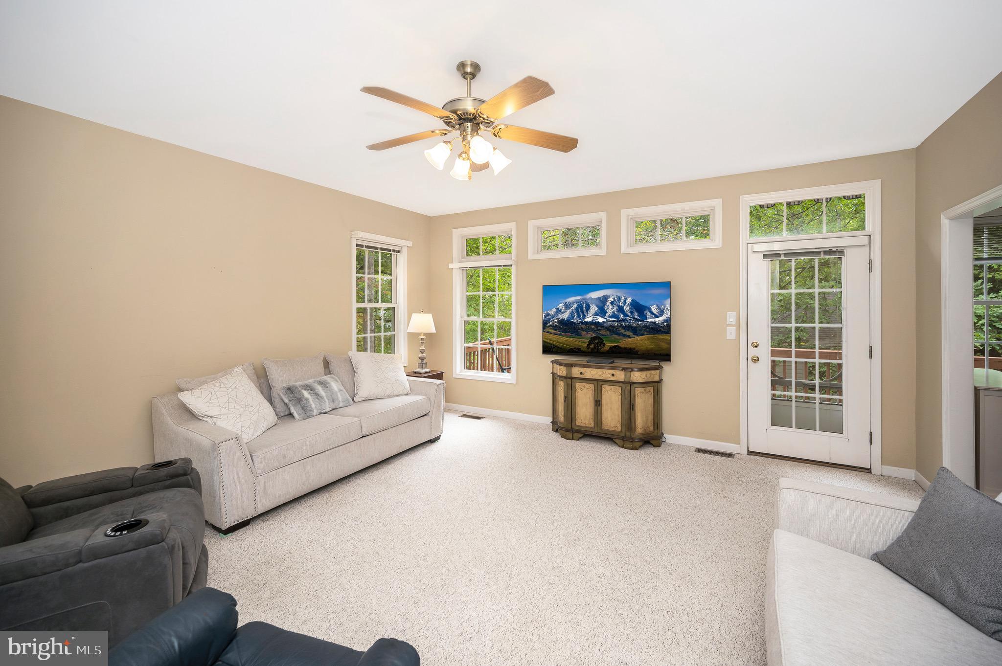 3800 Lakeview Parkway Locust Grove, VA 22508 - Photo 7 of 51 Spacious living room with deck access