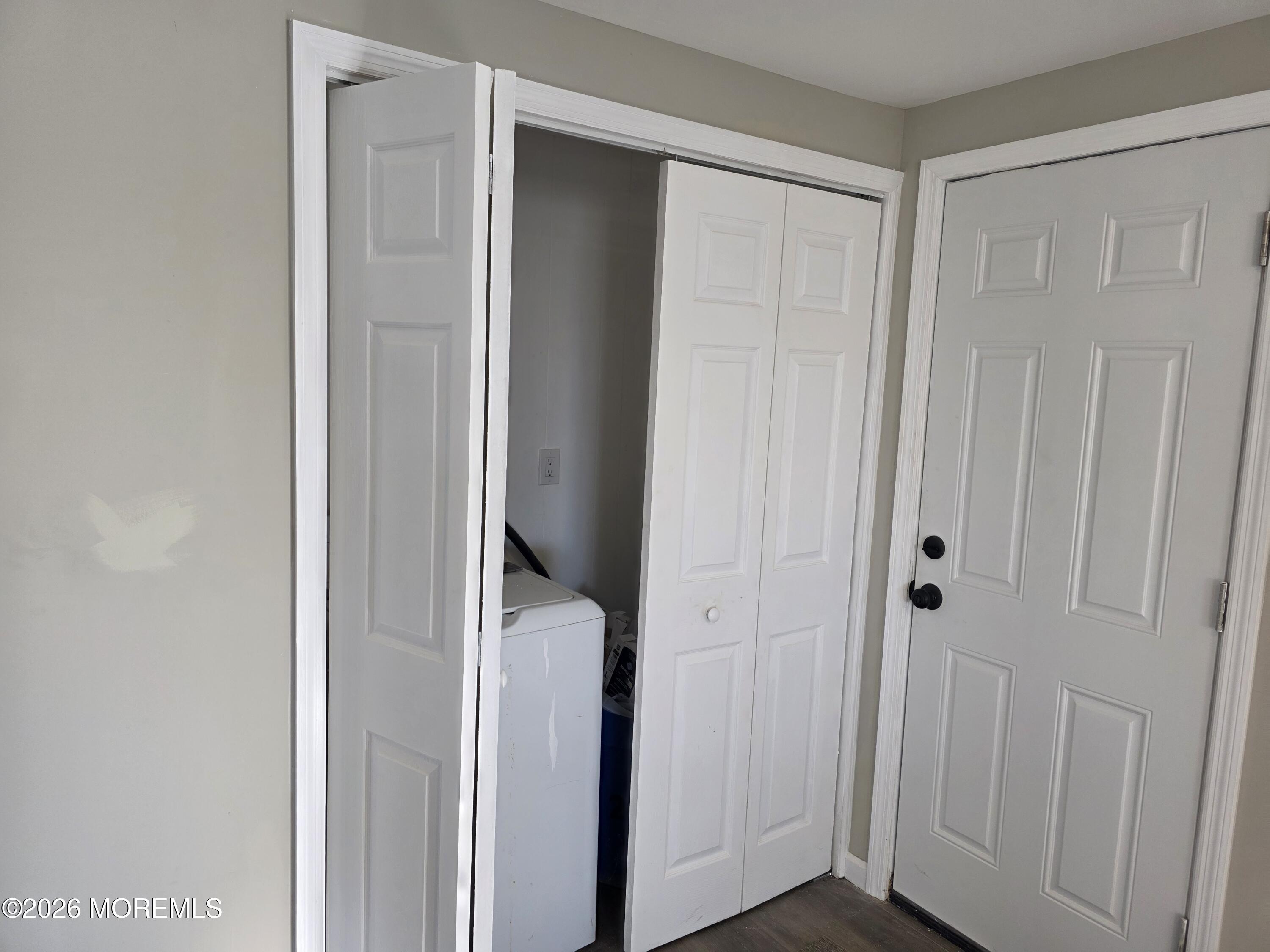 469 South Green Street, Unit 26 Tuckerton, NJ 08087 - Photo 17 of 17 a view of a bathroom with a wooden door
