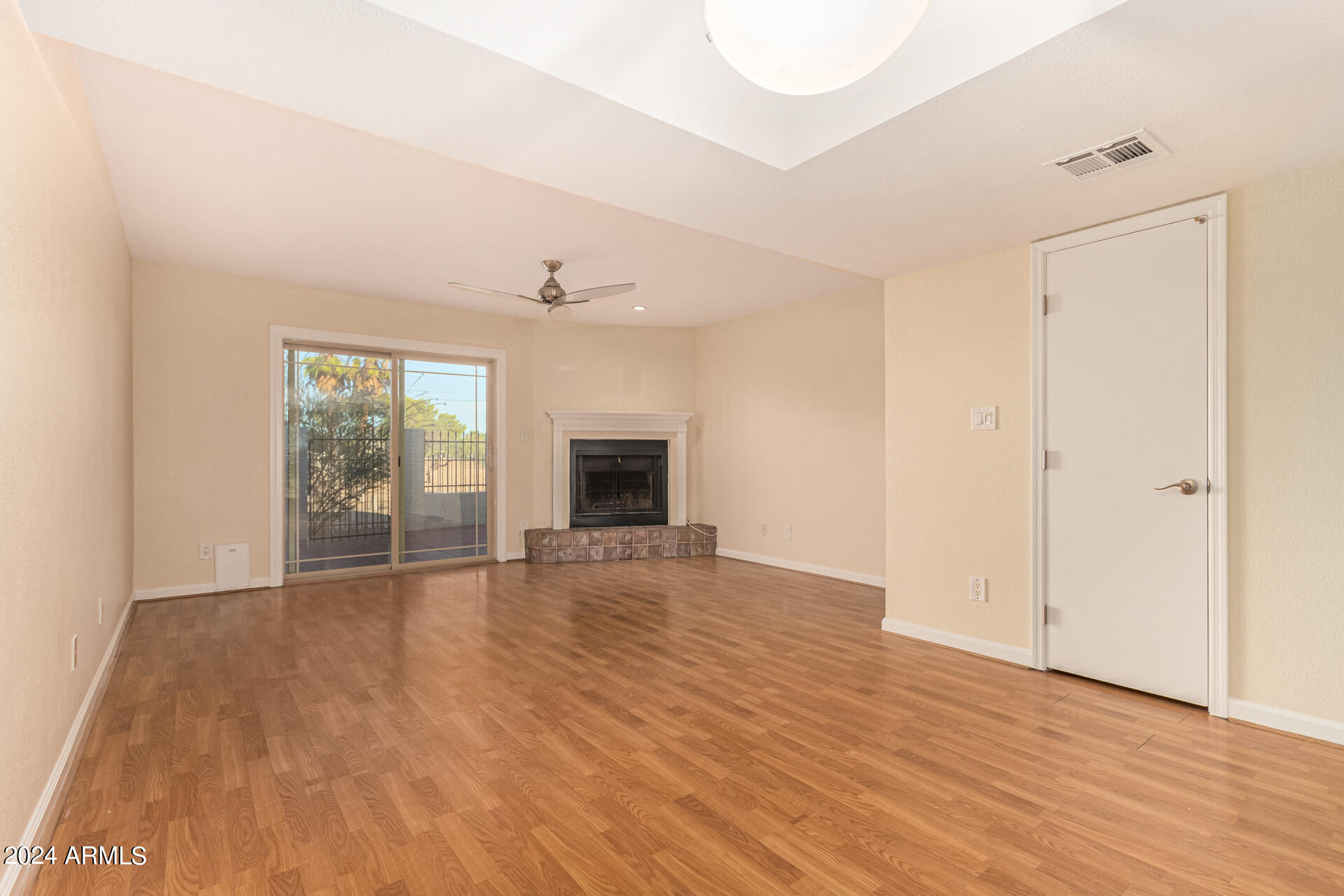 7755 East Thomas Road, Unit 7 Scottsdale, AZ 85251 - Photo 11 of 21 Fireplace With Tiled Hearth
