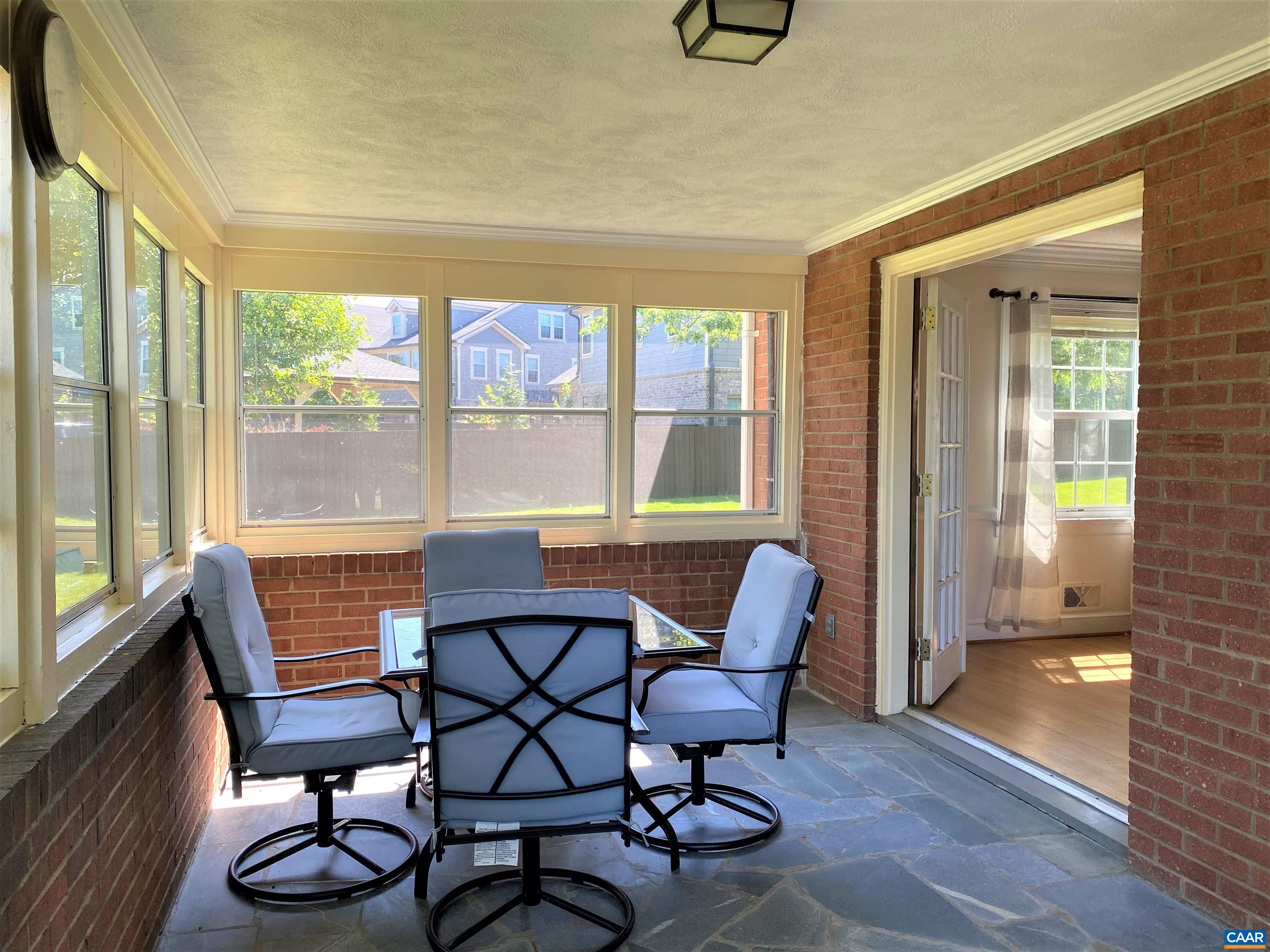 2401 Northfield Road Charlottesville, VA 22901 - Photo 19 of 23 a dining room with furniture and windows