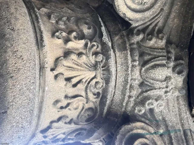 a view of a couch with wooden floor