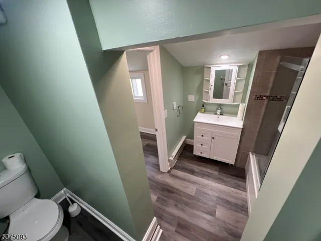 a bathroom with a sink and toilet