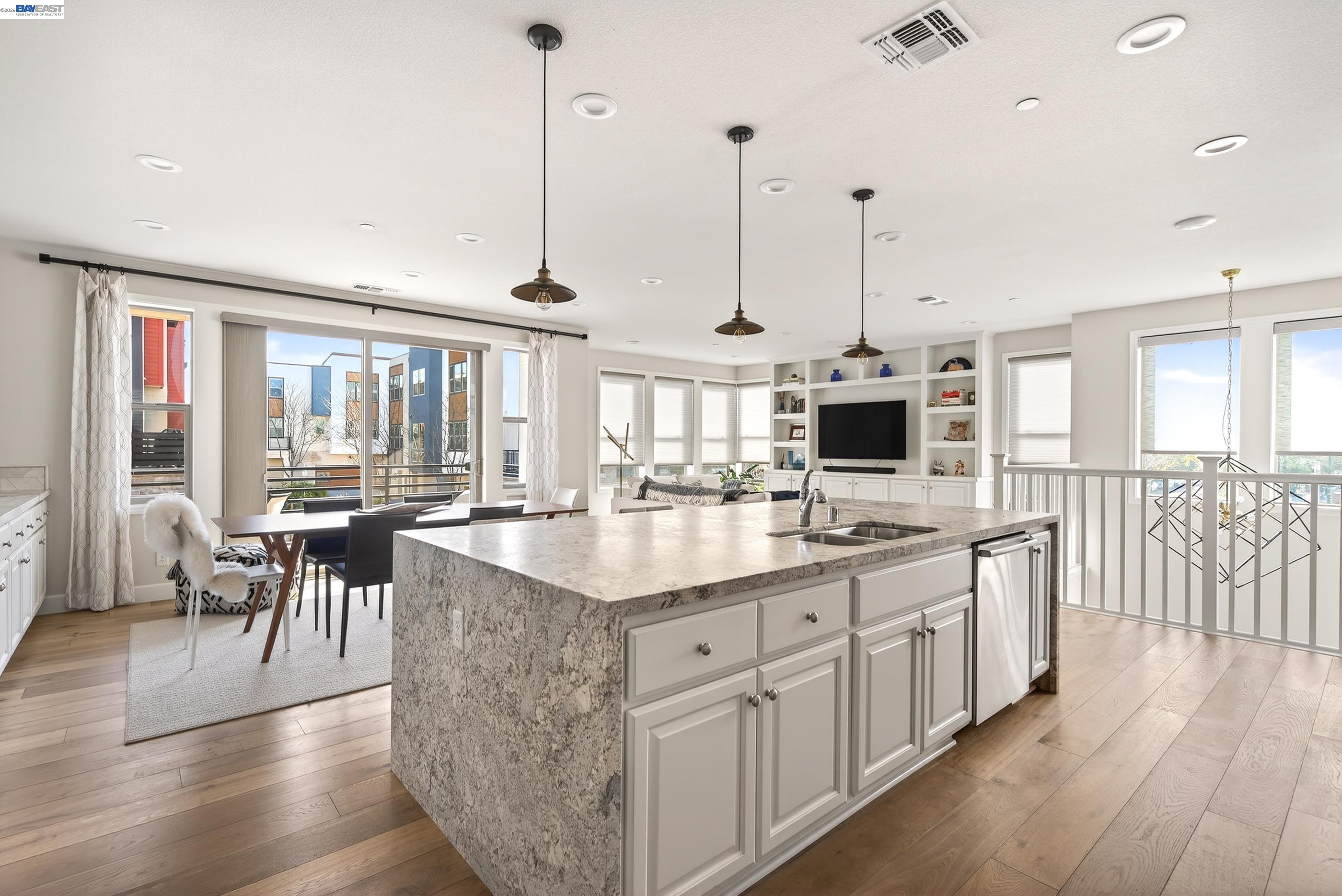 5531 Metropolitan Way Dublin, CA 94568 - Photo 3 of 56 a large kitchen with lots of counter space and a wooden floor