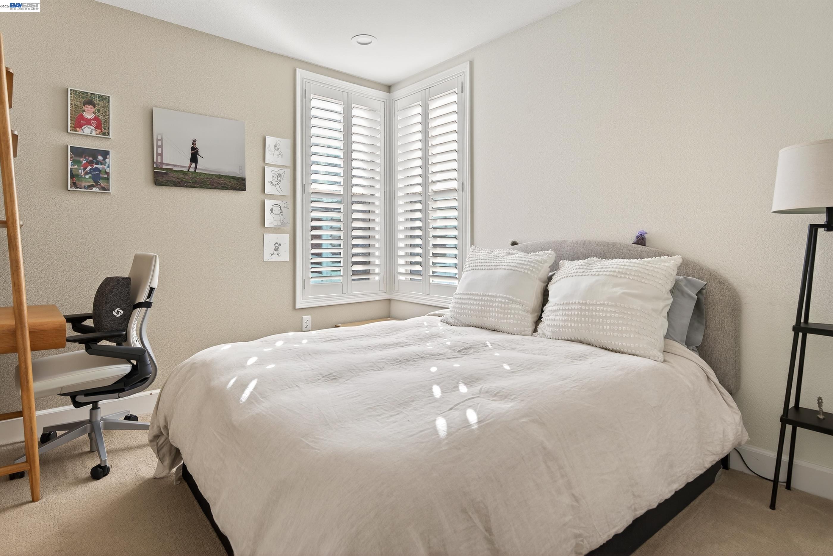 5531 Metropolitan Way Dublin, CA 94568 - Photo 40 of 56 a large bed sitting in a bedroom next to a window