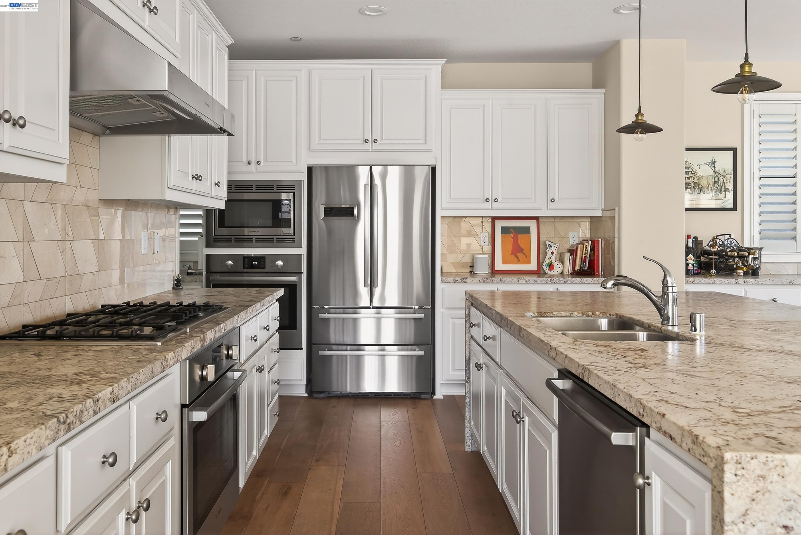 5531 Metropolitan Way Dublin, CA 94568 - Photo 8 of 56 a kitchen with granite countertop a sink stove and refrigerator