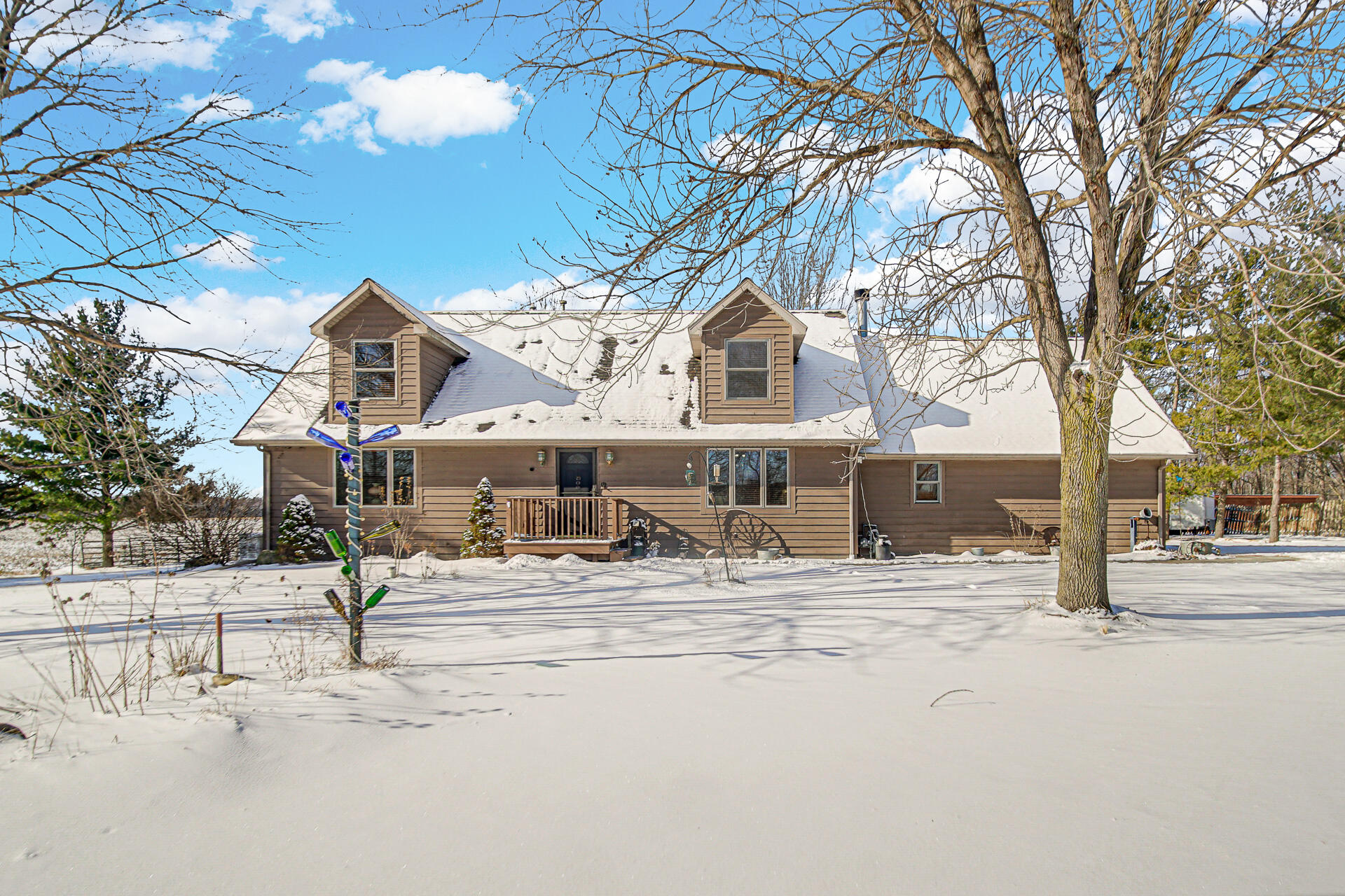 8524 North Wilhelm Road La Porte, IN 46350 - Photo 1 of 40 a house with trees in front of it