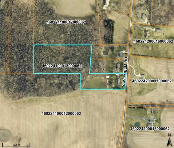 a view of a house with a snow in the yard