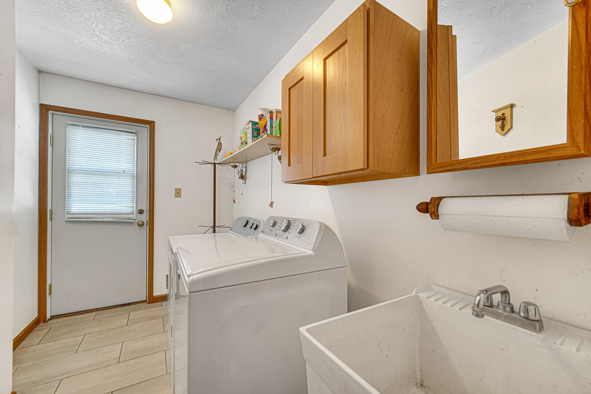 8524 North Wilhelm Road La Porte, IN 46350 - Photo 29 of 40 a bathroom with a sink and a mirror