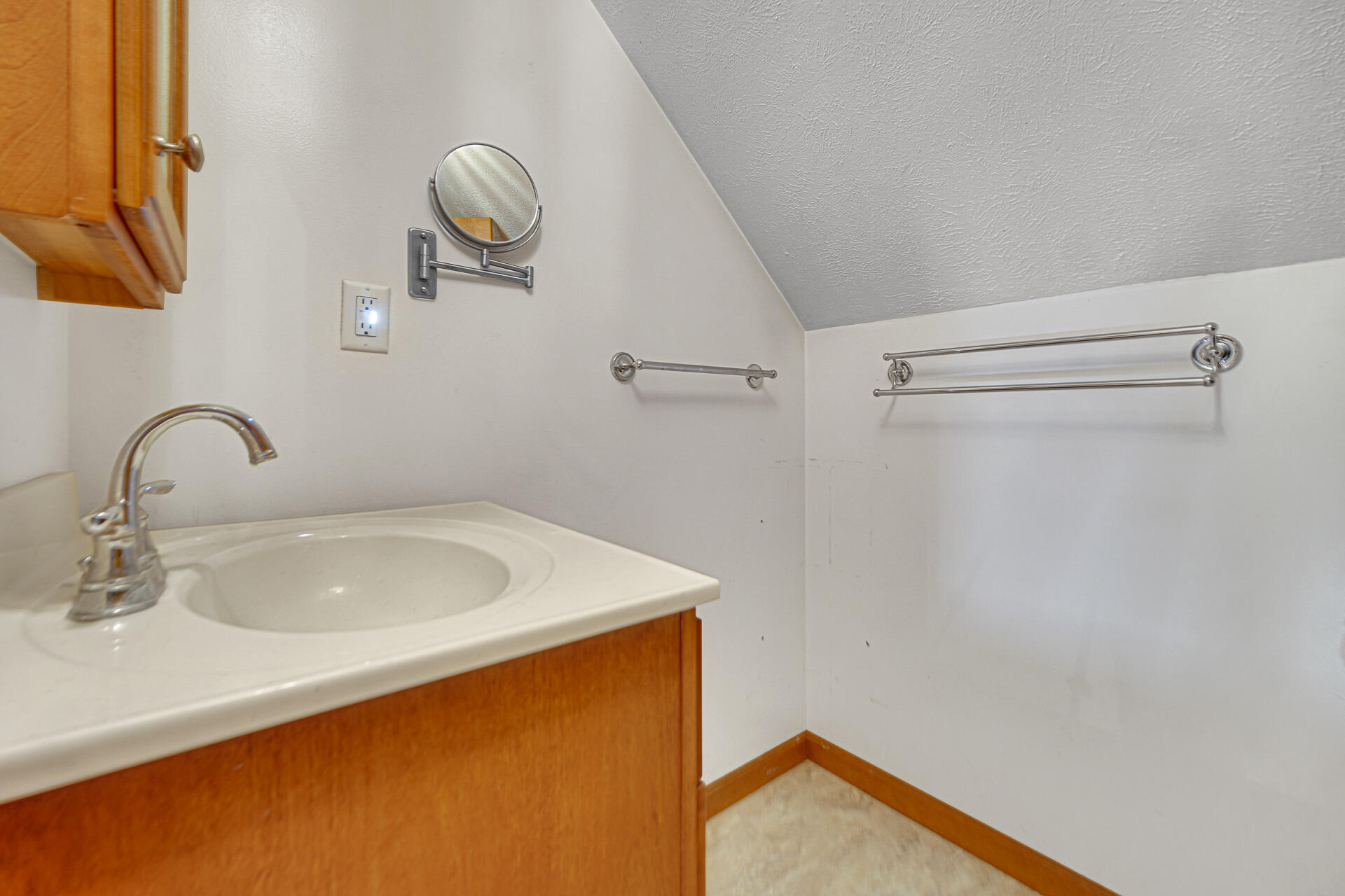 8524 North Wilhelm Road La Porte, IN 46350 - Photo 33 of 40 a bathroom with a sink and a mirror