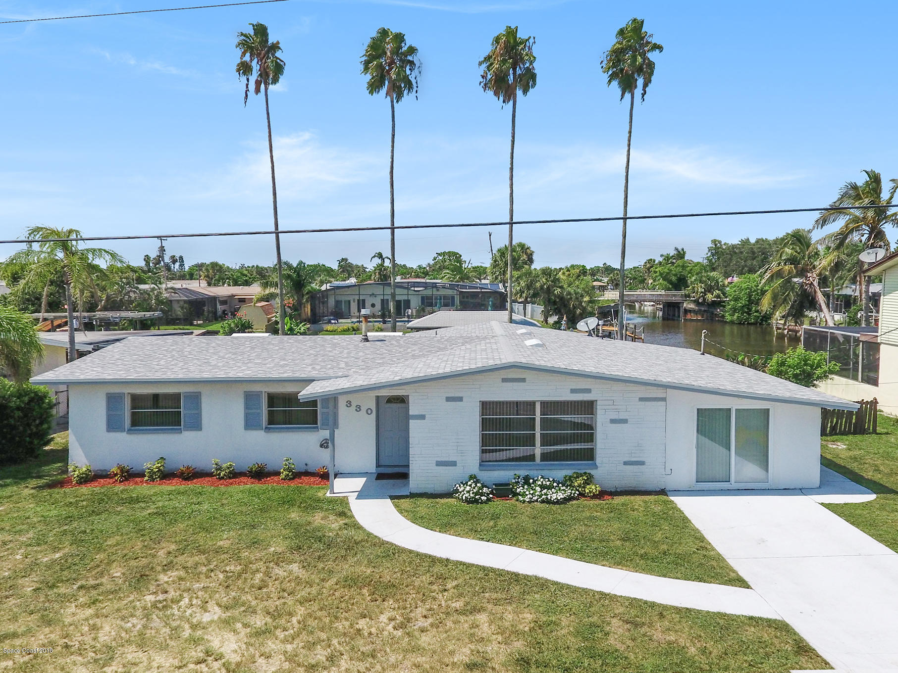 330 Riverside Avenue Merritt Island, FL 32953 - Photo 2 of 12 4 bed/2 bath Canalfront