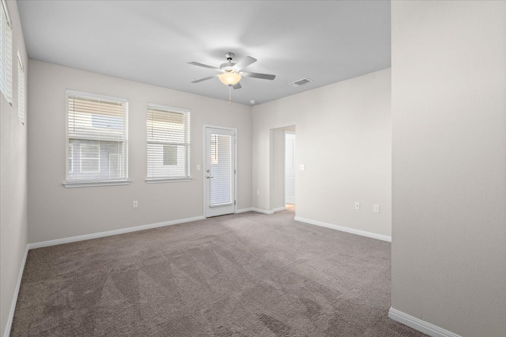 9015 Cattle Baron Path, Unit 705 Austin, TX 78747 - Photo 19 of 35 a view of an empty room with a window