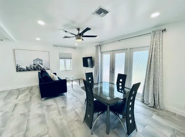 a view of a dining room with furniture