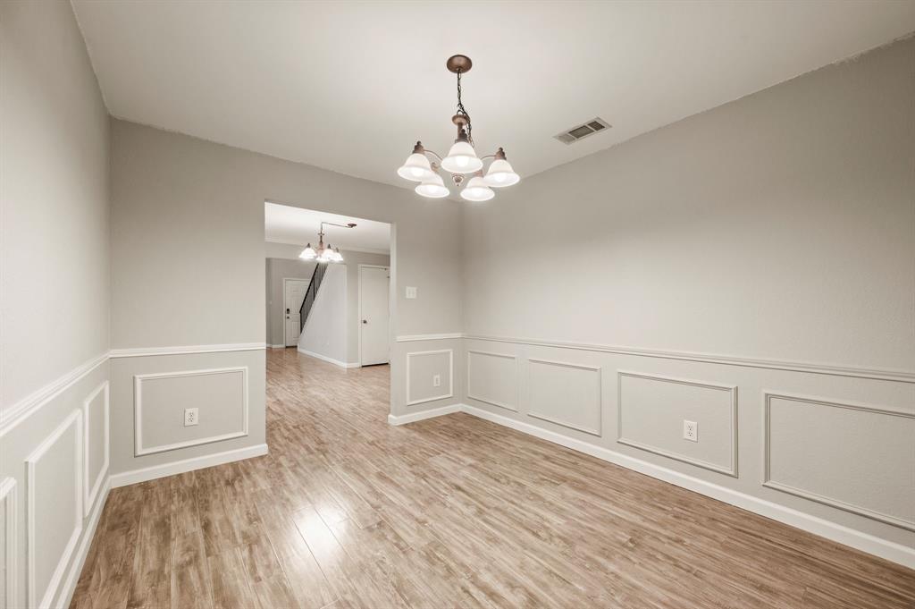 8713 Granite Path Fort Worth, TX 76244 - Photo 16 of 40 Secondary dining or flex space with decorative trim and updated lighting fixture.