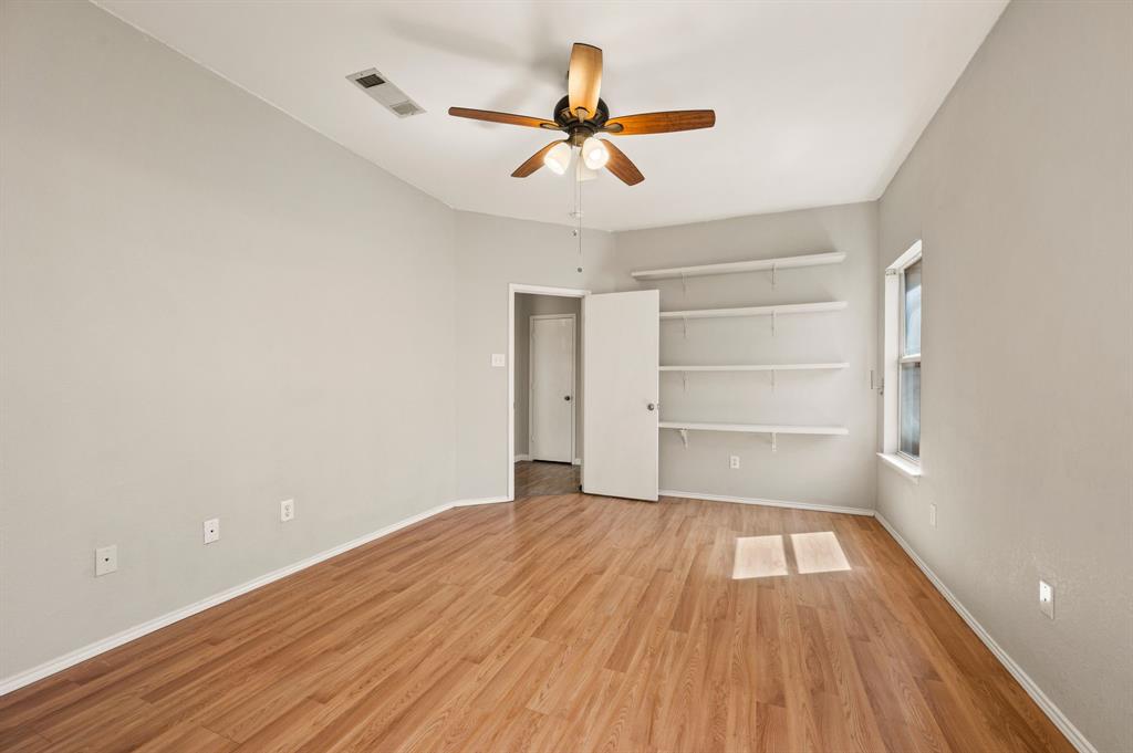 8713 Granite Path Fort Worth, TX 76244 - Photo 19 of 40 Primary bedroom alternate view with en-suite access and generous layout.