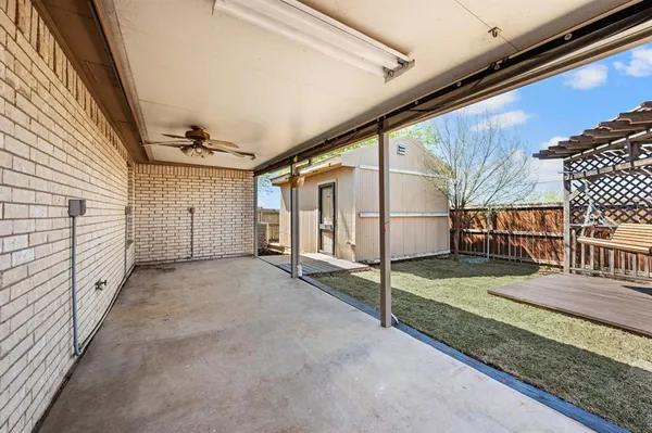 a view of a back yard of the house