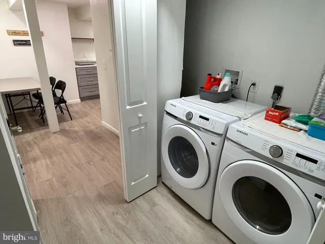 a view of washer and dryer in a utility room