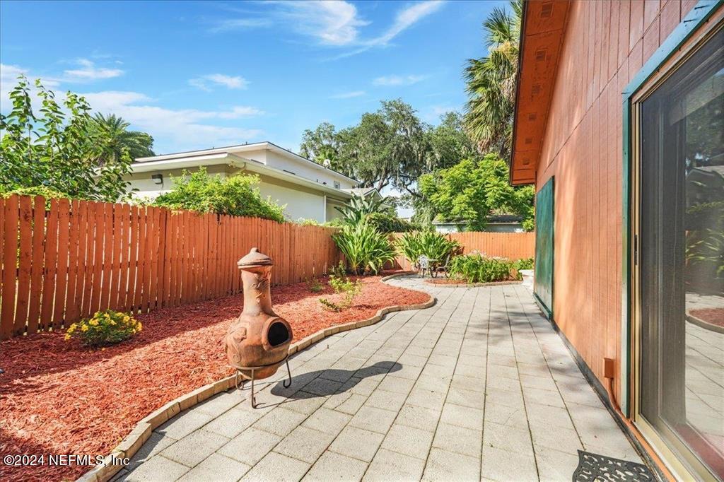 123 Unicorn Road St. Augustine, FL 32086 - Photo 33 of 51 a view of a backyard with sitting area